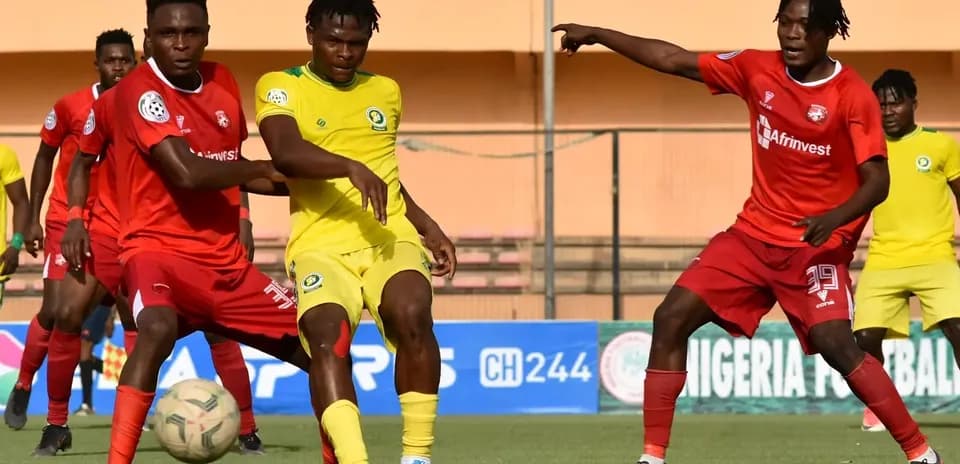 Enugu Rangers players challenging Katsina United