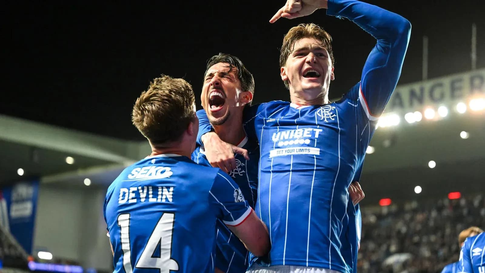 Rangers players celebrating a goal in match