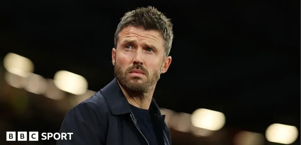 Coach observing the match from the sidelines