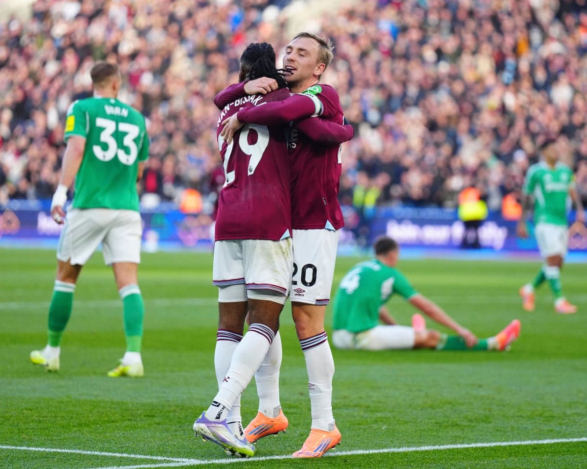 Players celebrating after a goal in match