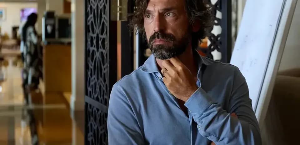 Man with beard and long hair in hotel lobby