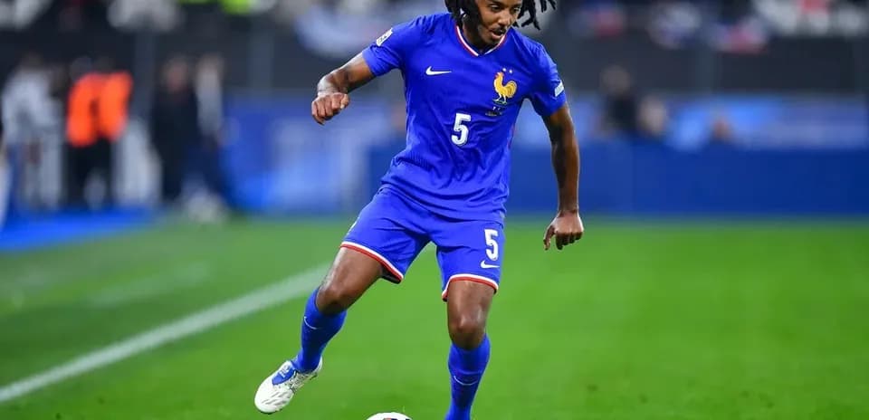 Player dribbling the ball during a football match
