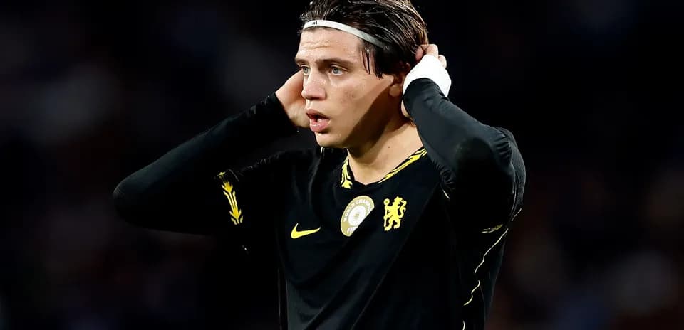 Player holding head in distress during match