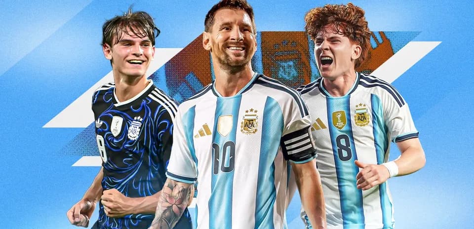 Three Argentine football players celebrating in team jerseys
