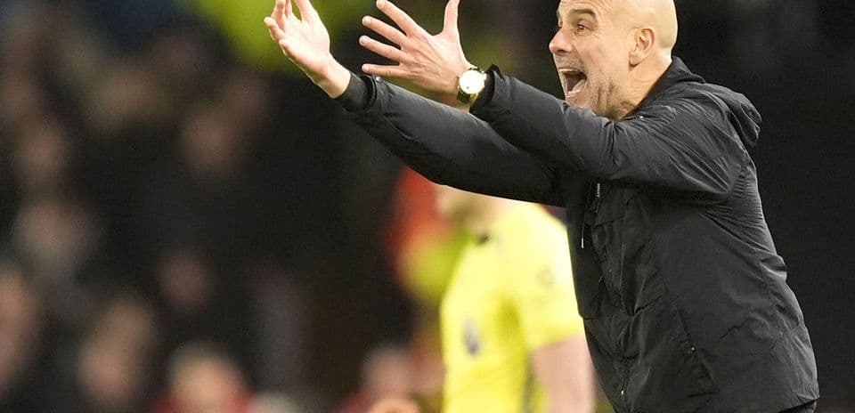 Coach gesturing during a match from the sidelines