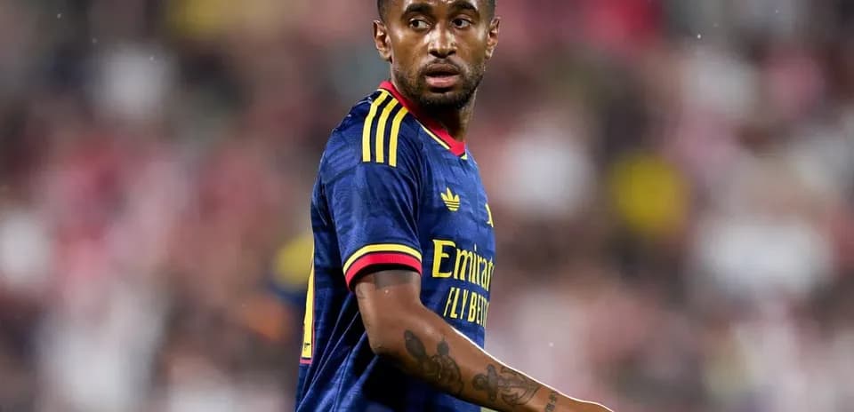 Player wearing Arsenal jersey during match