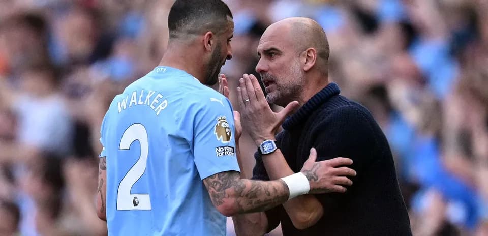 Pep Guardiola discussing tactics with Kyle Walker