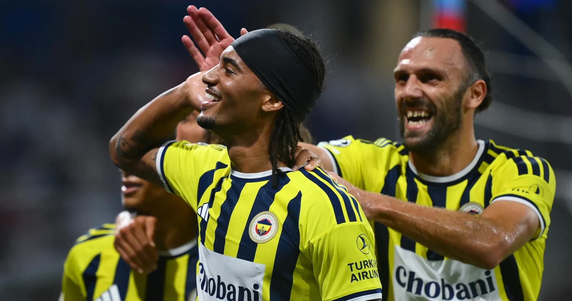 Fenerbahçe players celebrating a goal during match