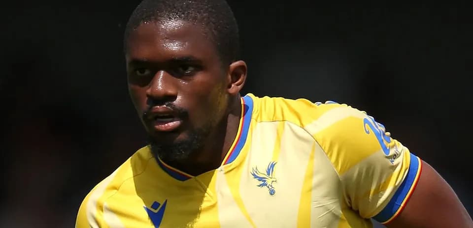 Player in yellow jersey running during match