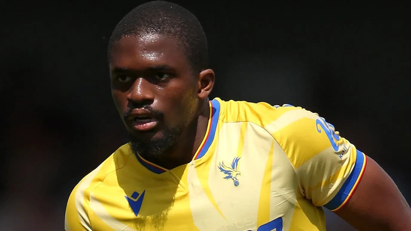 Player in yellow jersey running during match