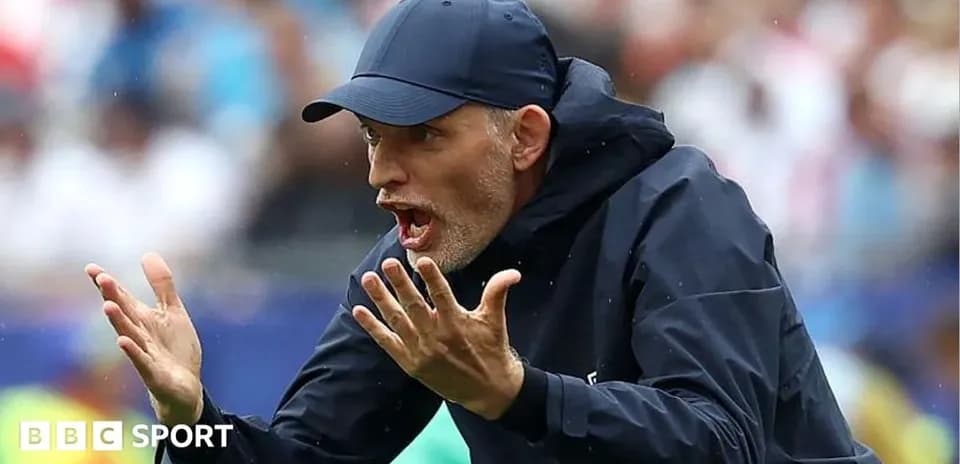Coach gesturing on the sidelines during match
