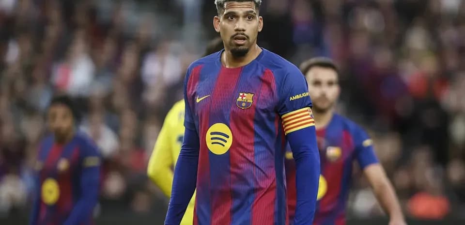 Barcelona player wearing captain's armband on pitch