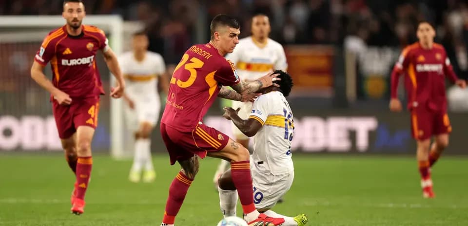 Players contesting for the ball during match
