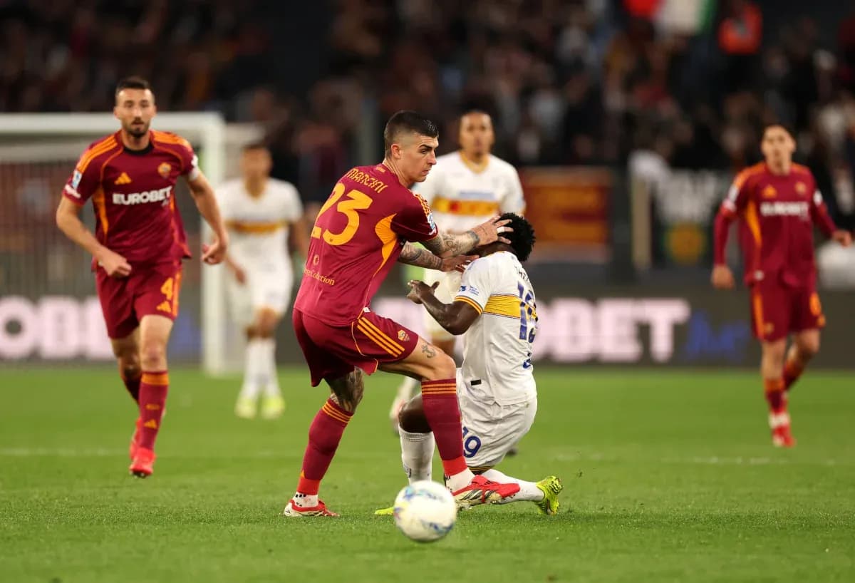 Players contesting for the ball during match