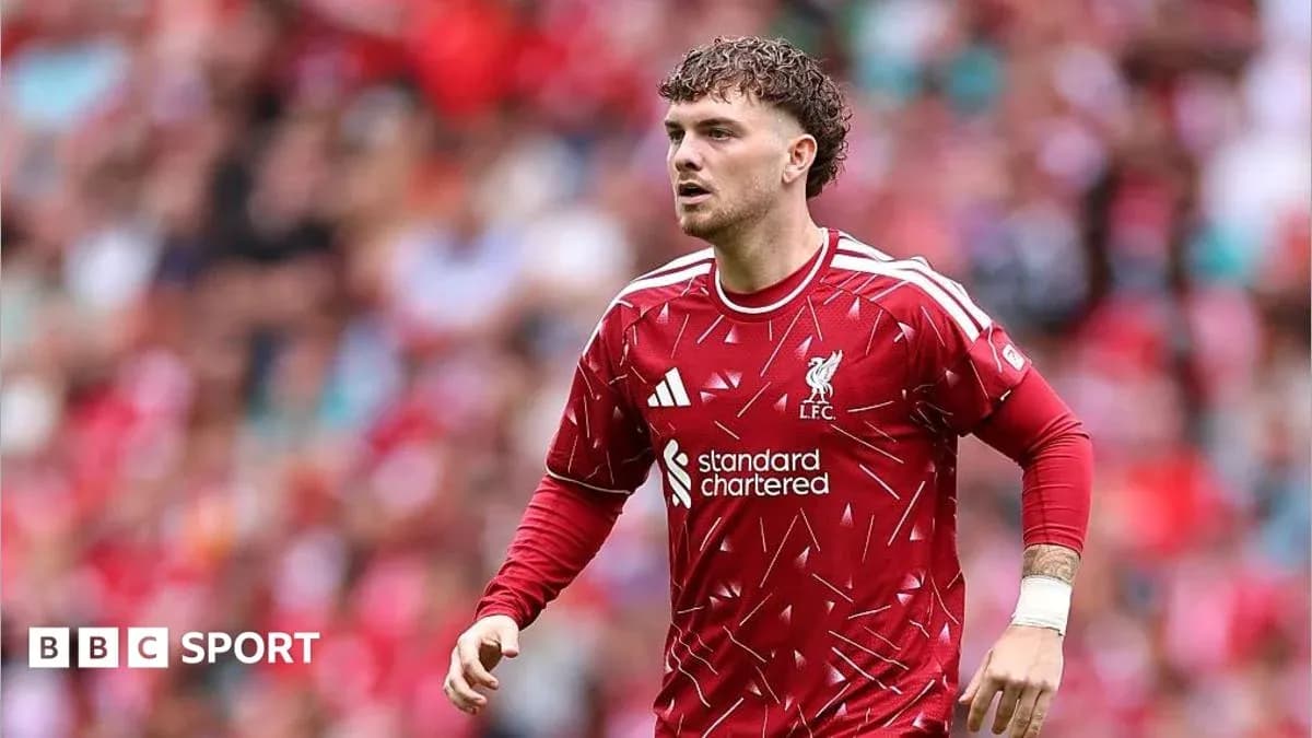 Player in Liverpool kit running on the pitch
