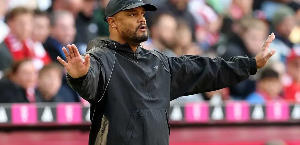 Coach giving instructions during a football match