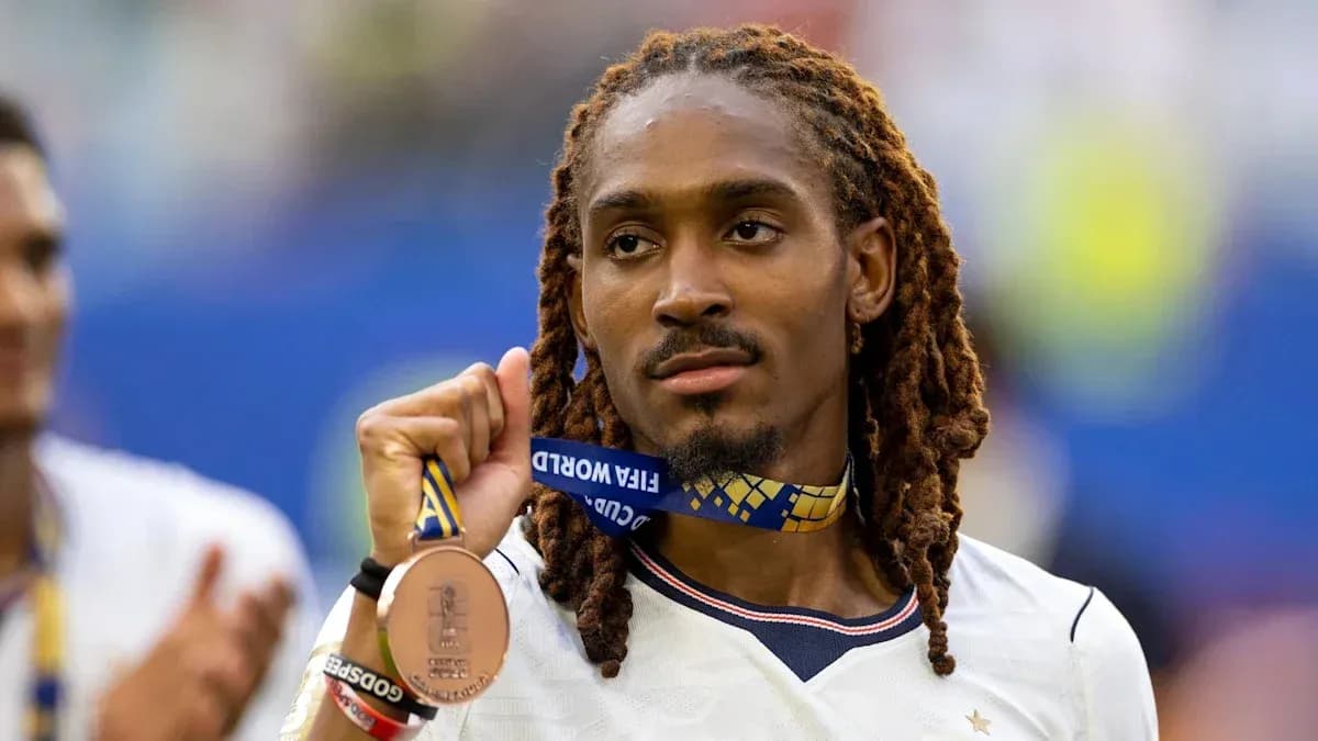 Player holding bronze medal after FIFA World Cup