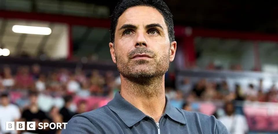 Coach observing match from the sidelines