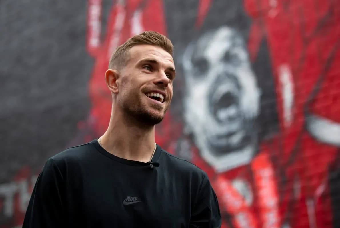 Player standing in front of mural background