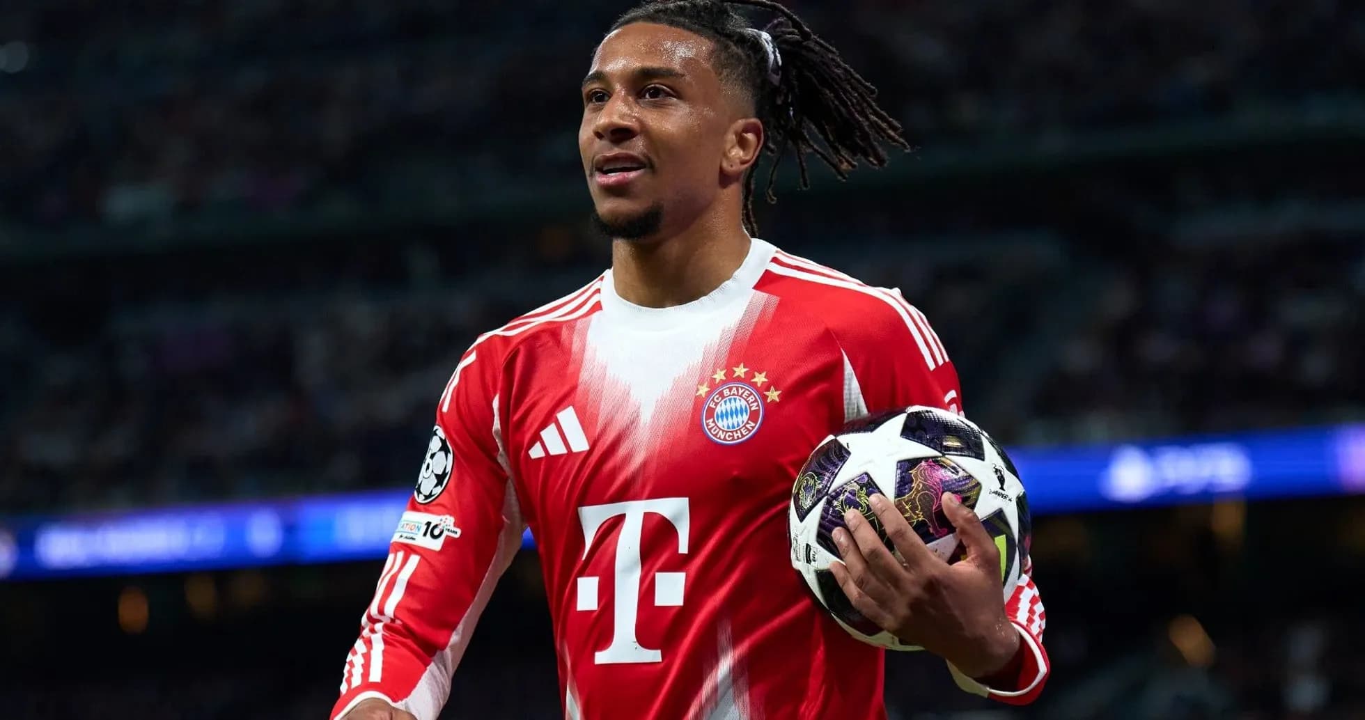 Player holding a ball during UEFA Champions League match