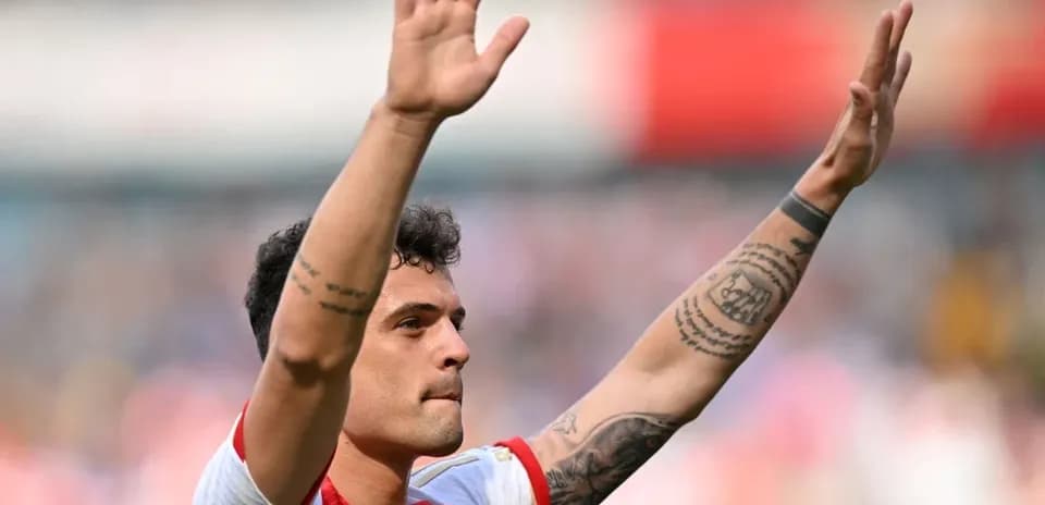 Player waving to fans after match