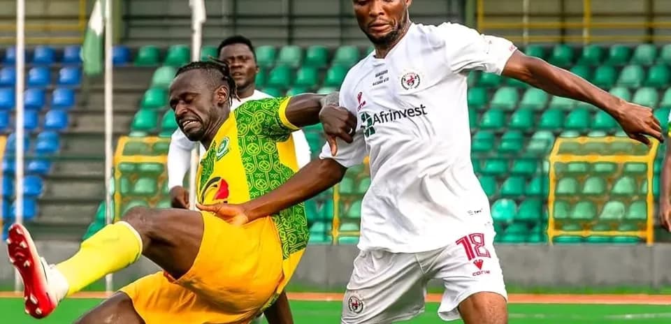 Players contesting for the ball in NPFL match