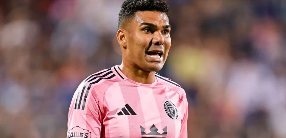 Player wearing pink jersey during match action