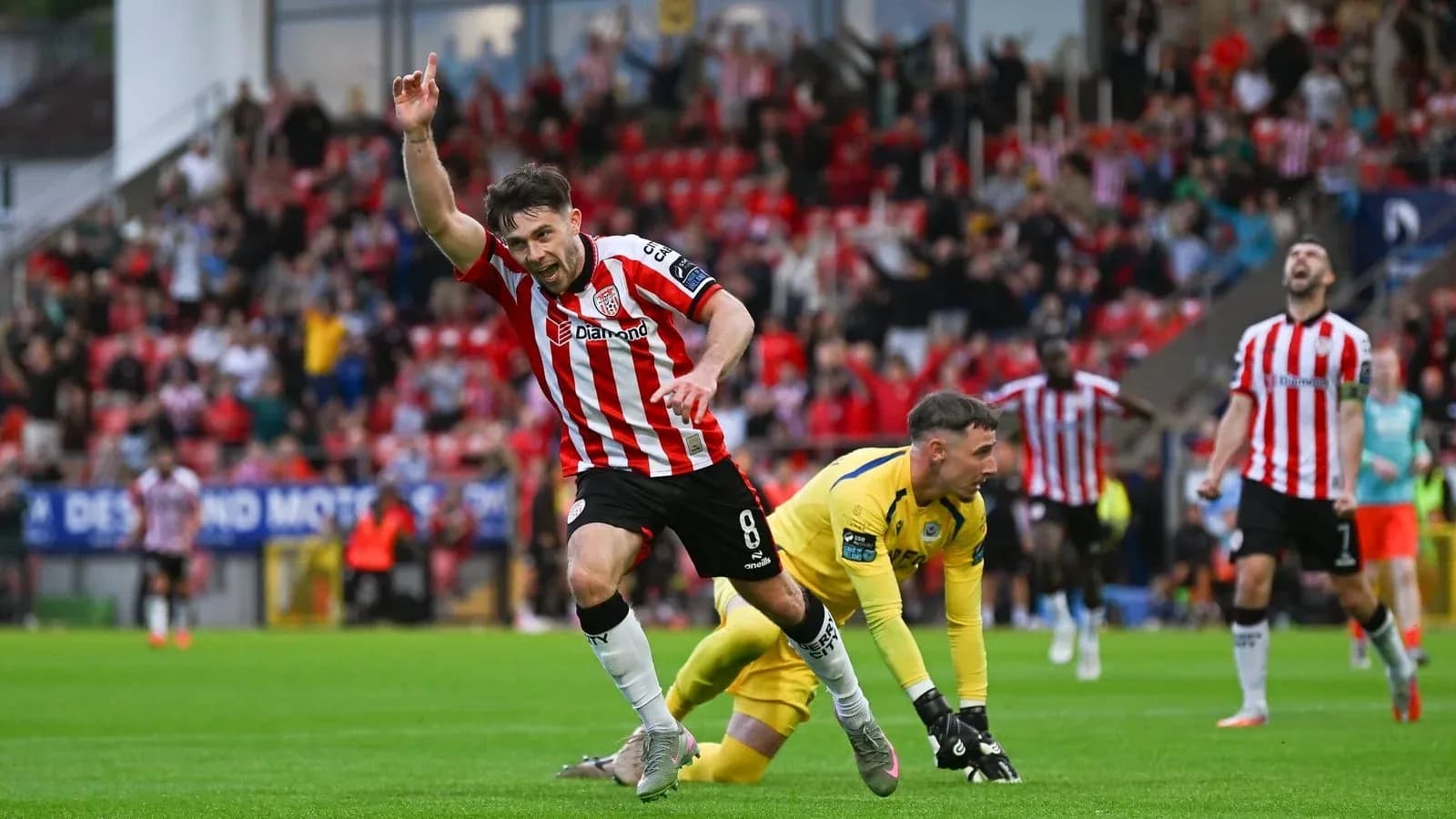 Player celebrating after scoring during match