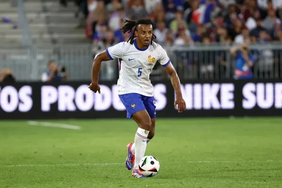 Player dribbling the ball during football match