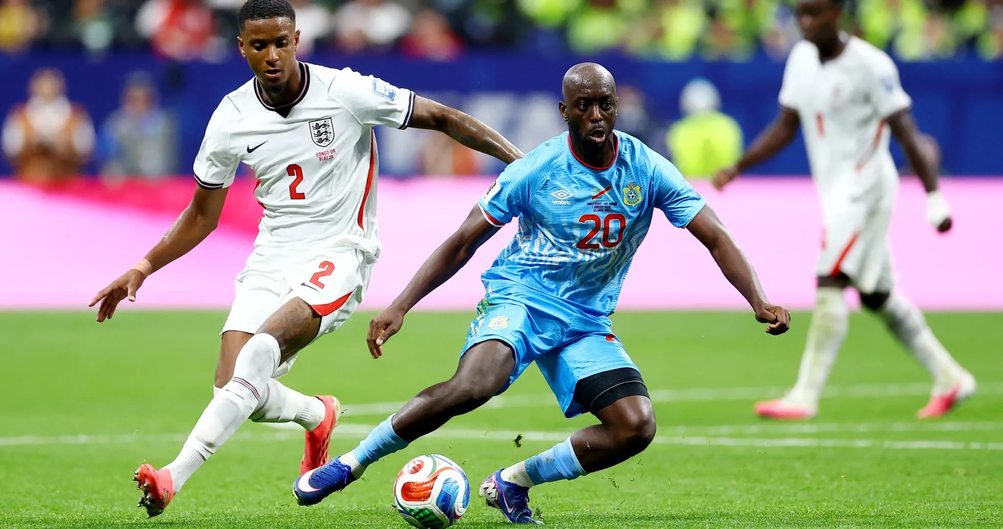 England player tackling Congo DR player during match