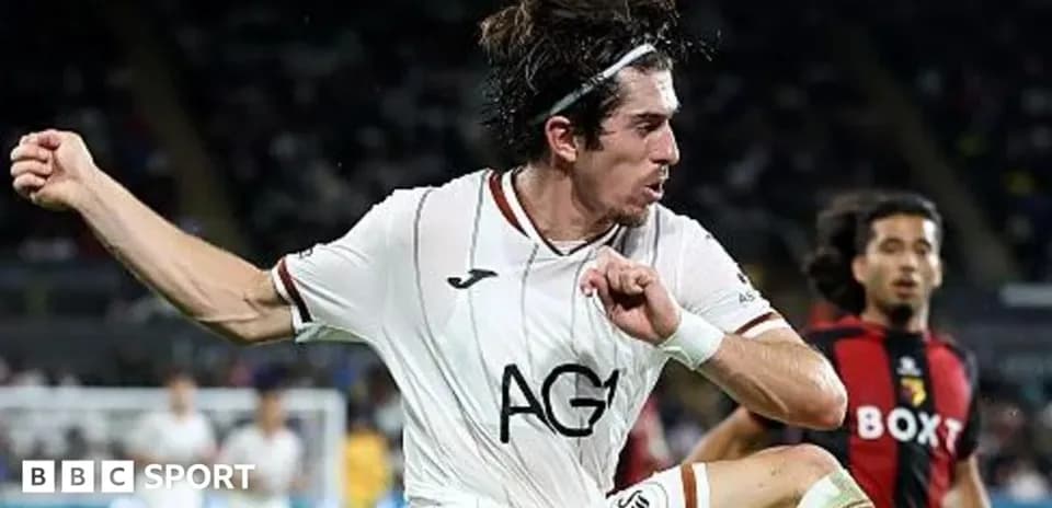 Player kicking the ball during a match
