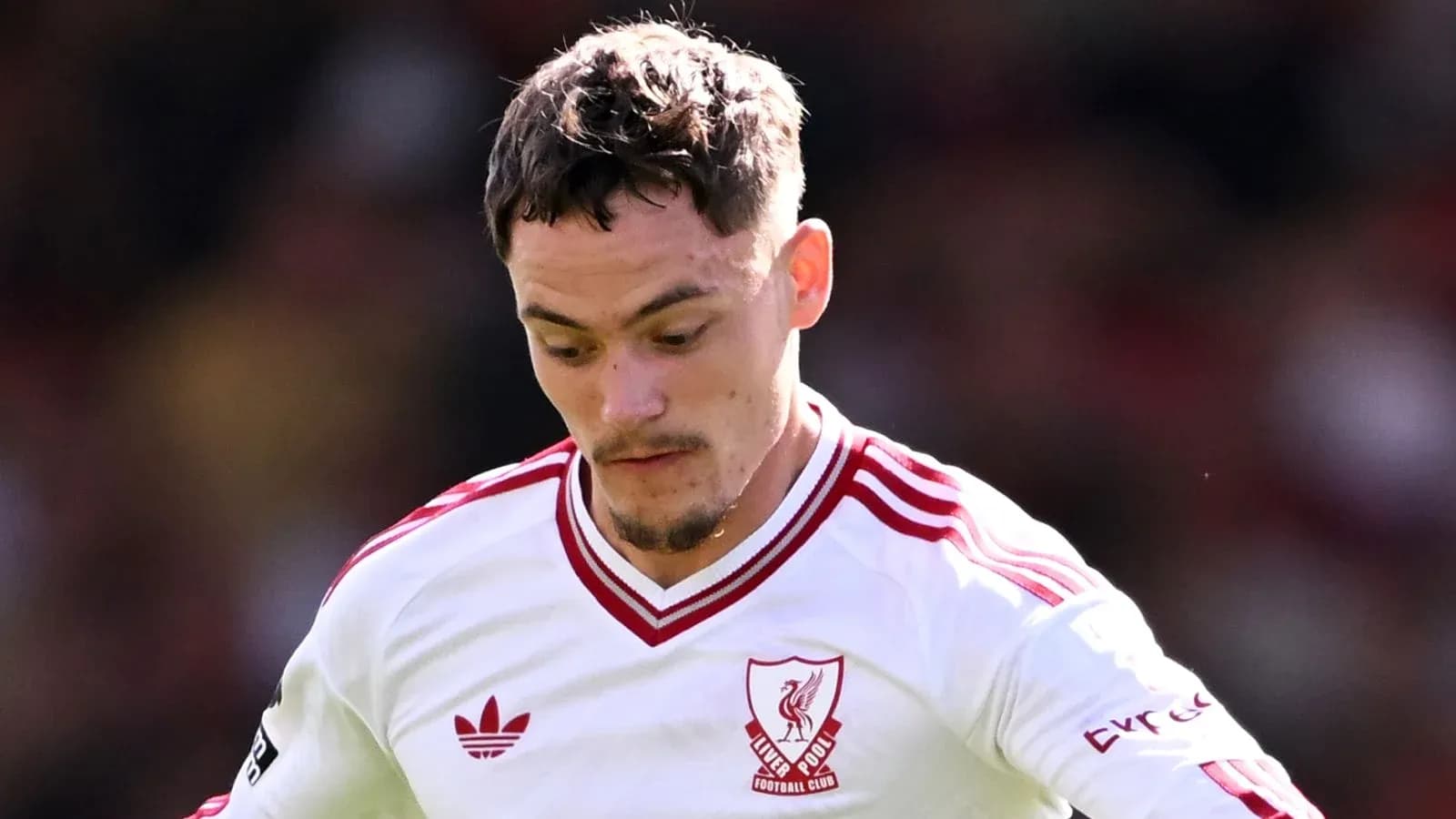 Player in Liverpool kit during match action