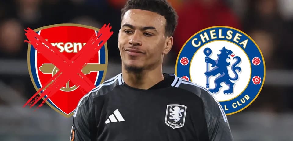 Player in goalkeeping kit with club logos