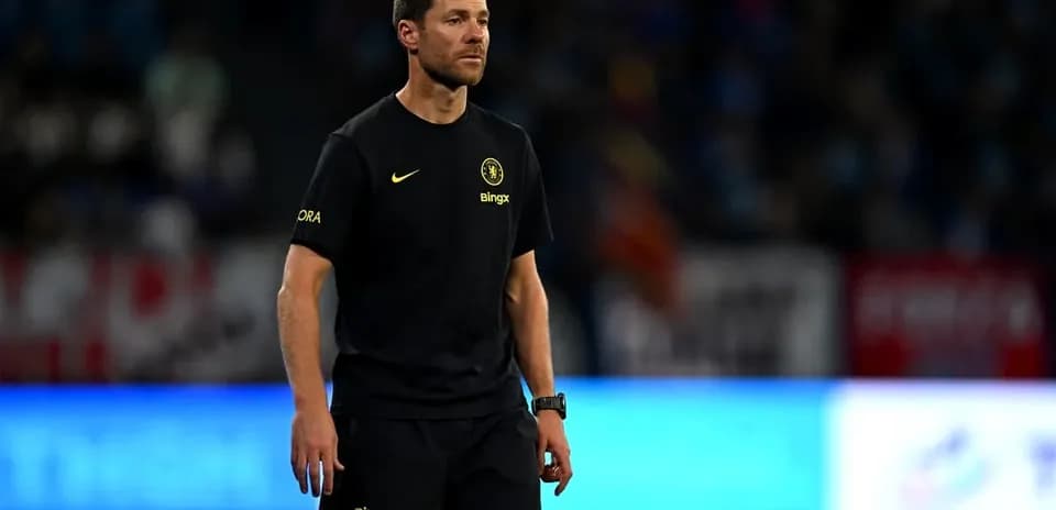 Coach walking on the sidelines during a match