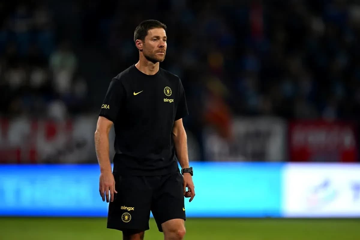 Coach walking on the sidelines during a match