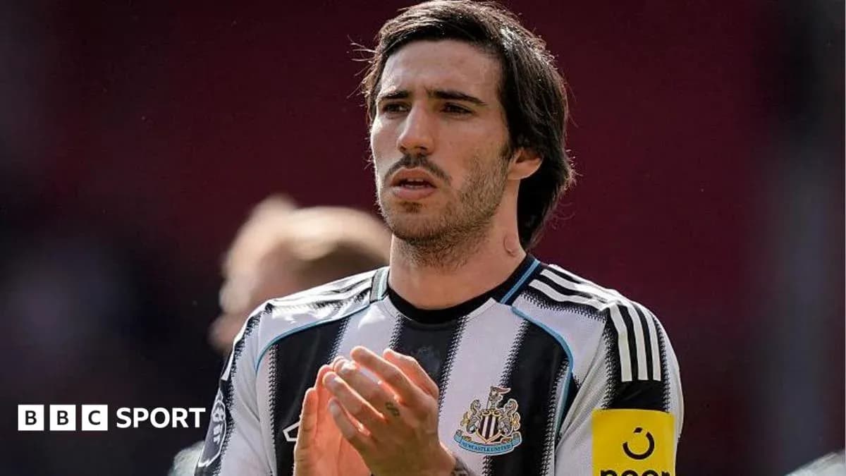 Newcastle player applauding fans after match