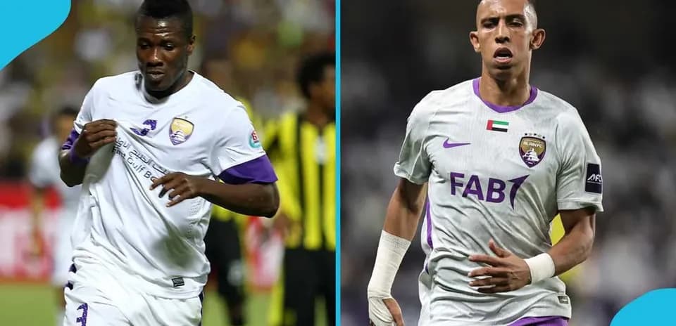 Two football players in Al Ain FC jerseys running
