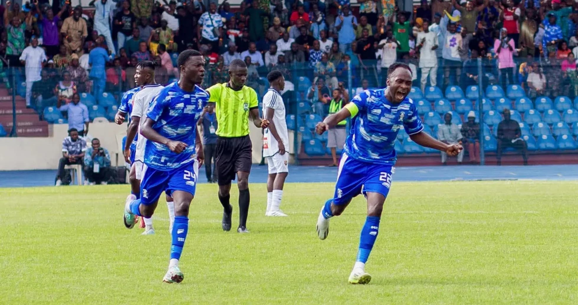 Players celebrating during Warri Wolves match