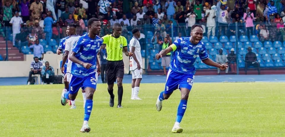 Players celebrating during Warri Wolves match