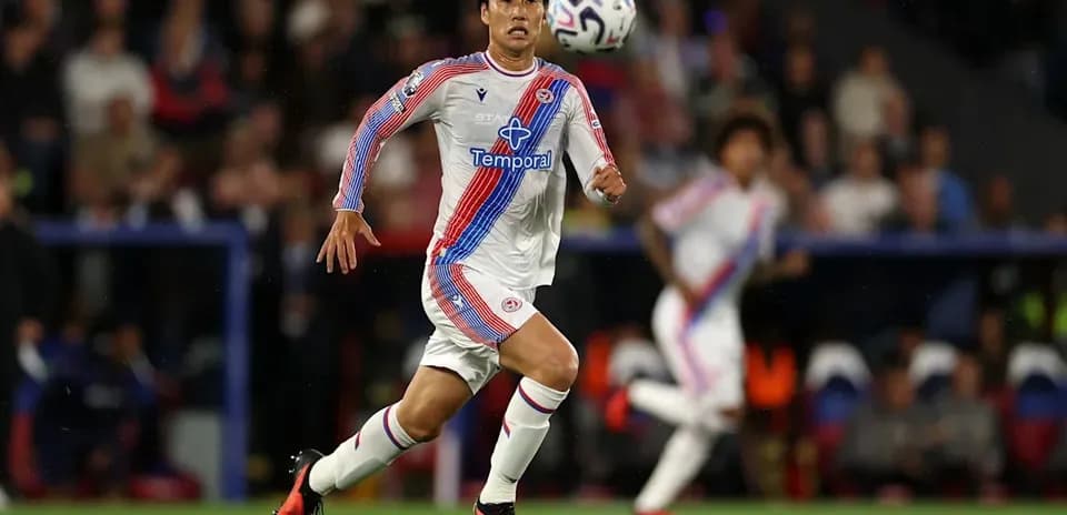 Player running with ball during a match