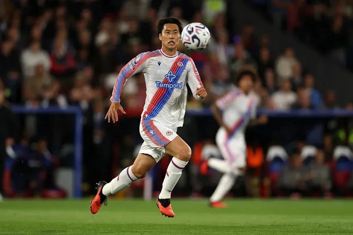 Player running with ball during a match