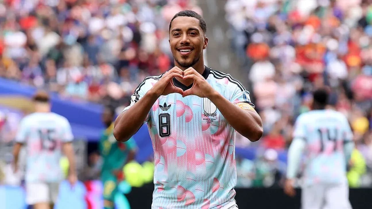Player celebrating with heart gesture after scoring