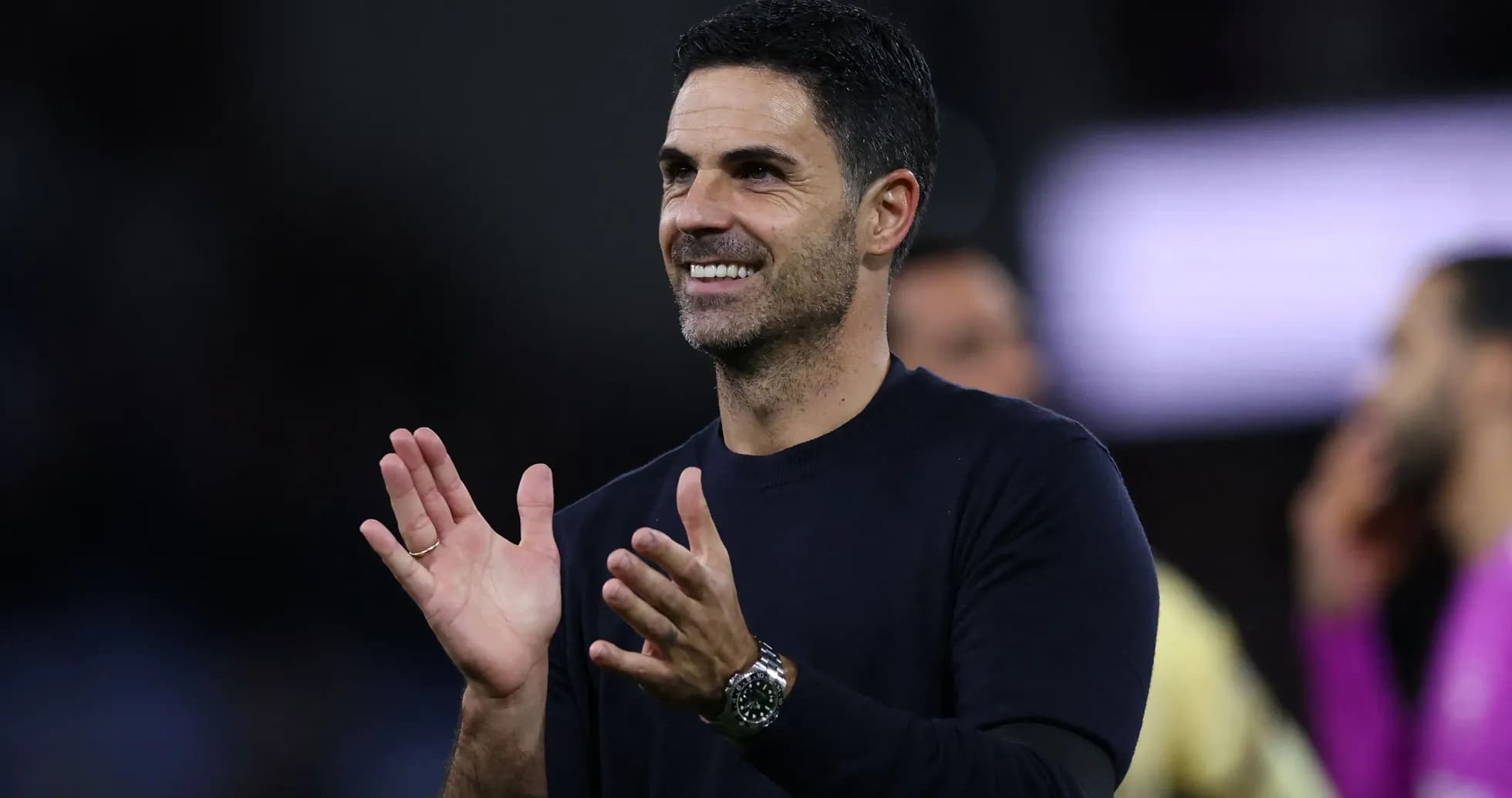 Coach applauding during a match celebration