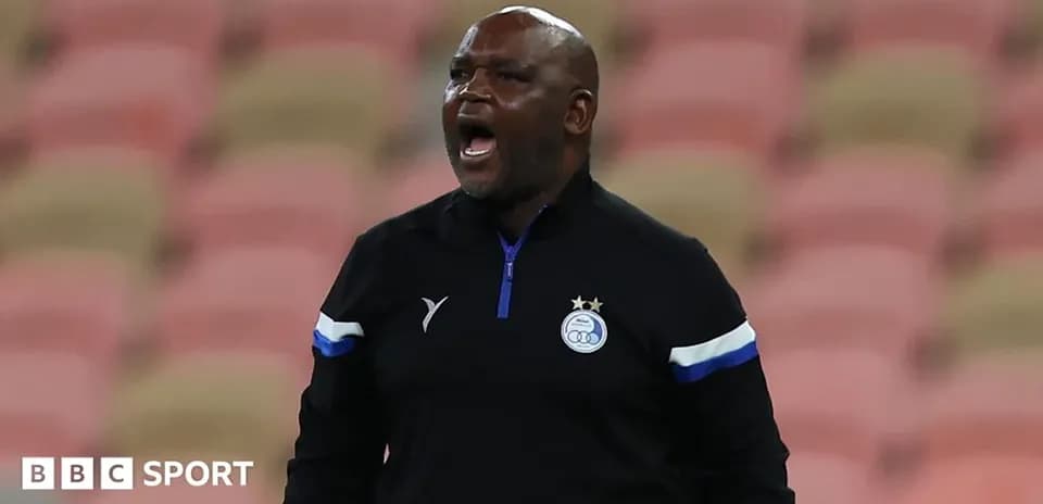 Coach shouting from the sidelines during a match