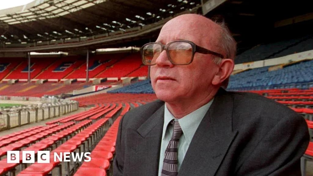 Man sitting in empty stadium seating area