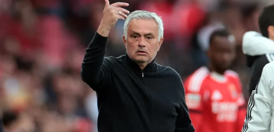 Manager gesturing during match from the sidelines