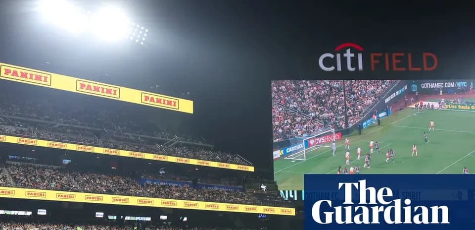 Soccer match at Citi Field with crowd and scoreboard