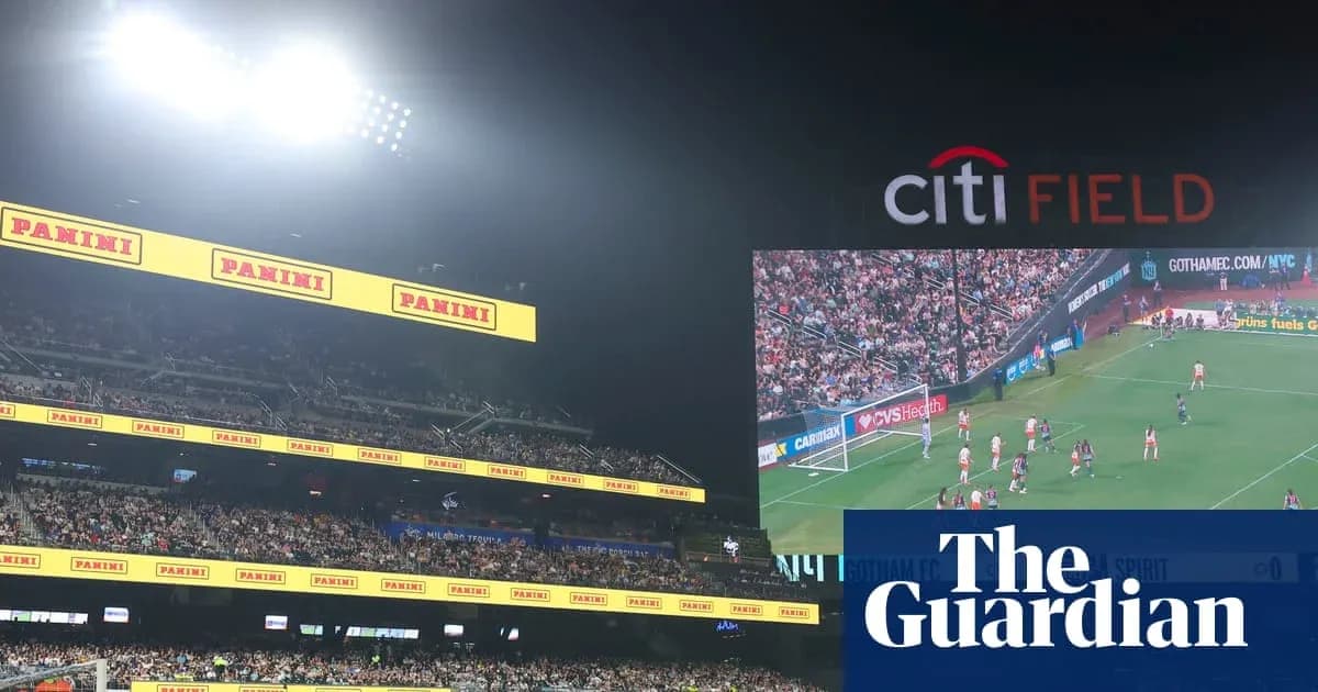 Soccer match at Citi Field with crowd and scoreboard