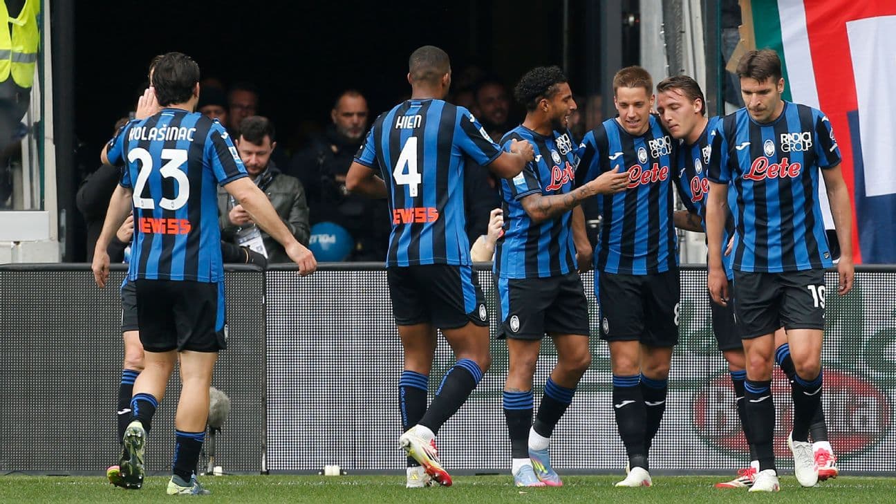 Atalanta players celebrating a goal together