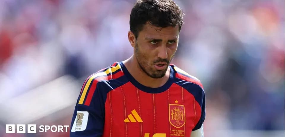 Spain player in red jersey during match